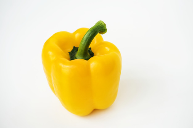 Macro shot of sweet bell pepper isolated on white background